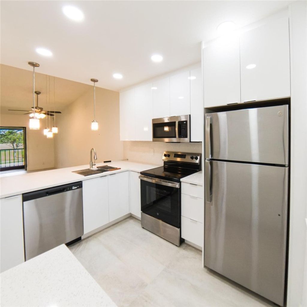 Photo of 6585 Somerset Drive #203, Boca Raton, FL 33433 (MLS # F10471277)