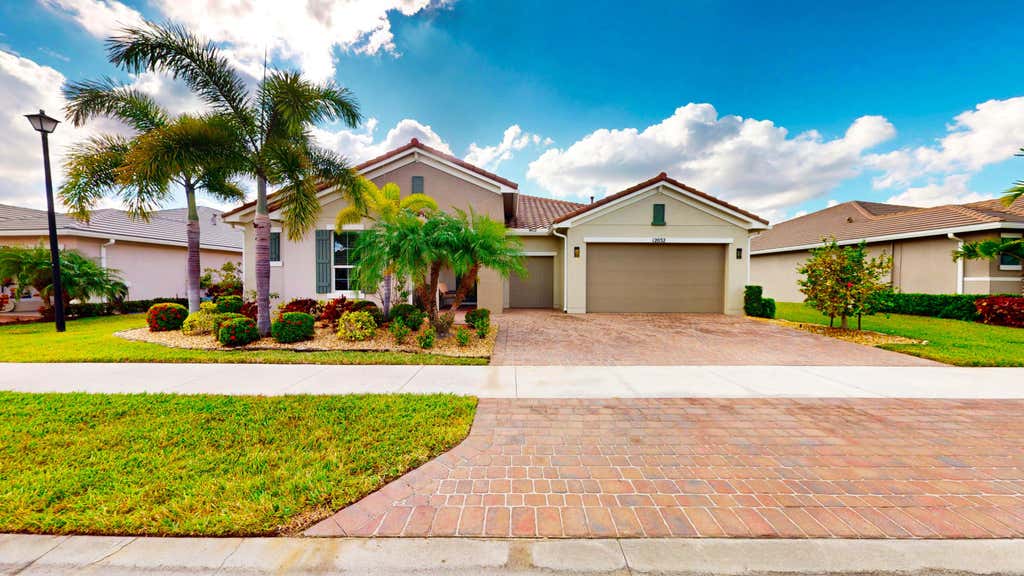 Photo of 12032 SW Marigold Avenue, Port Saint Lucie, FL 34987 (MLS # R11143092)