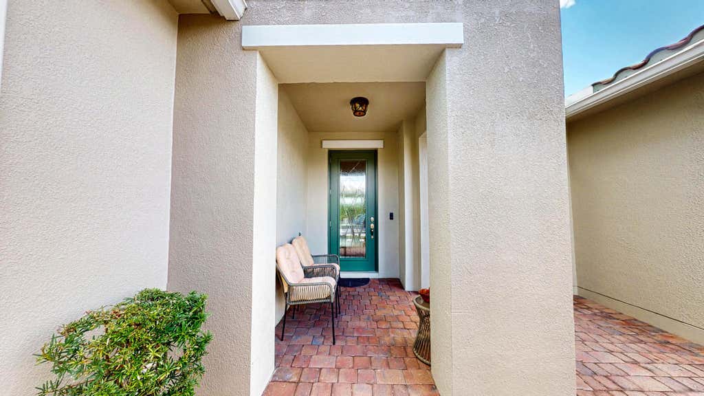 Photo of 12032 SW Marigold Avenue, Port Saint Lucie, FL 34987 (MLS # R11143092)