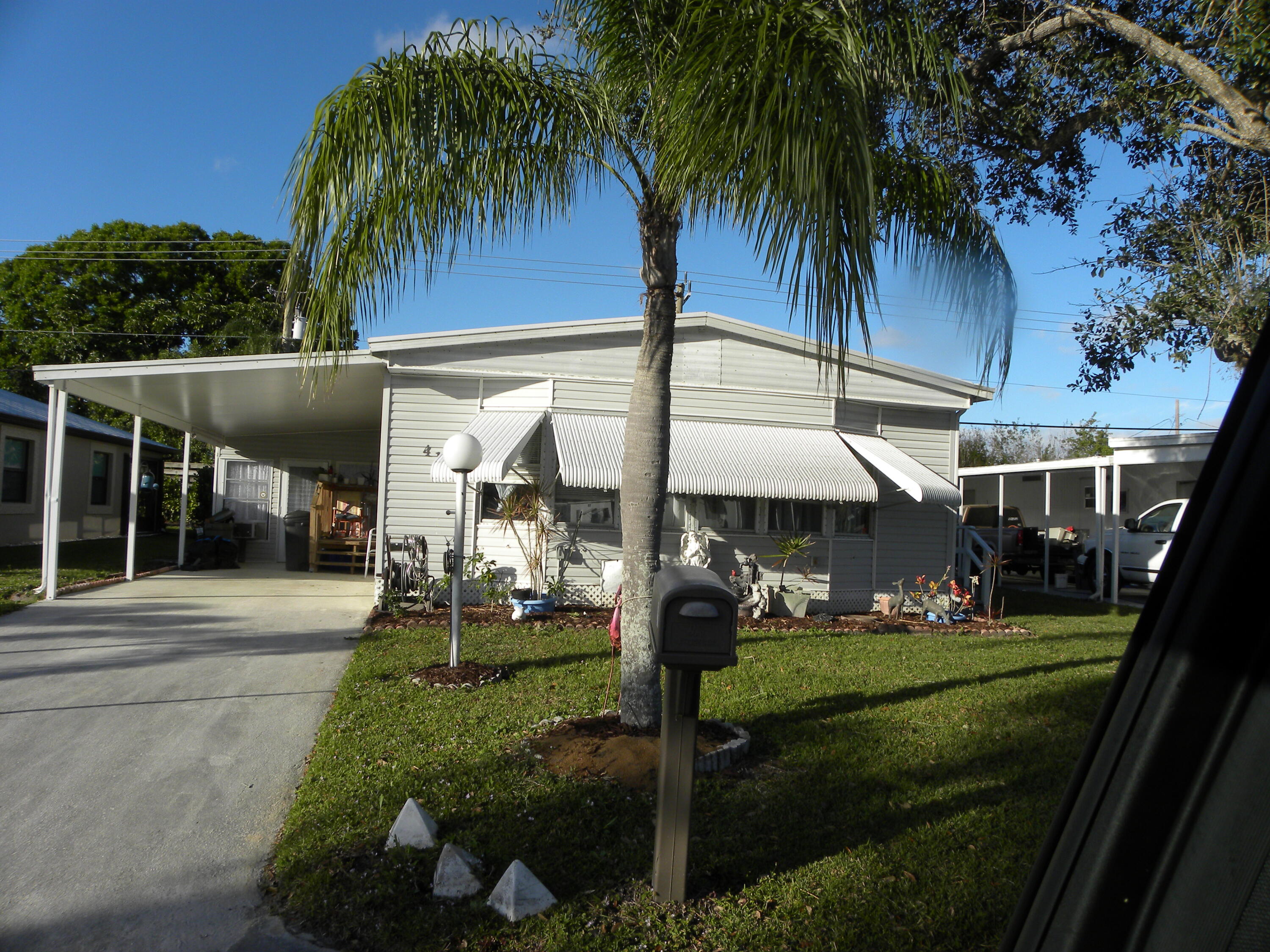 This home is ready to move in to. The second bath has had the shower removed and washer and dryer put in. It can be made into a full second bath again as there are washer and dryer hookups in the shed. Living areas are large, newer kitchen and fantastic screened/florida room. Don't miss this one. all information to be verified by the buyer.