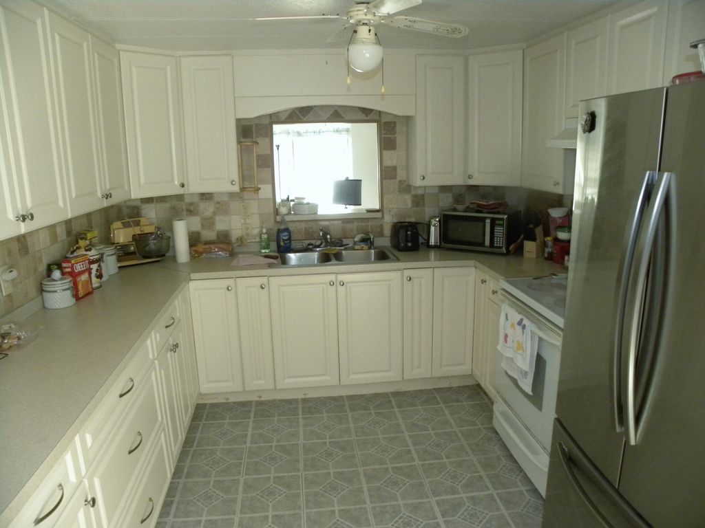 Photo of 41 Camino Del Rio, Port Saint Lucie, FL 34952 (MLS # R10957573)