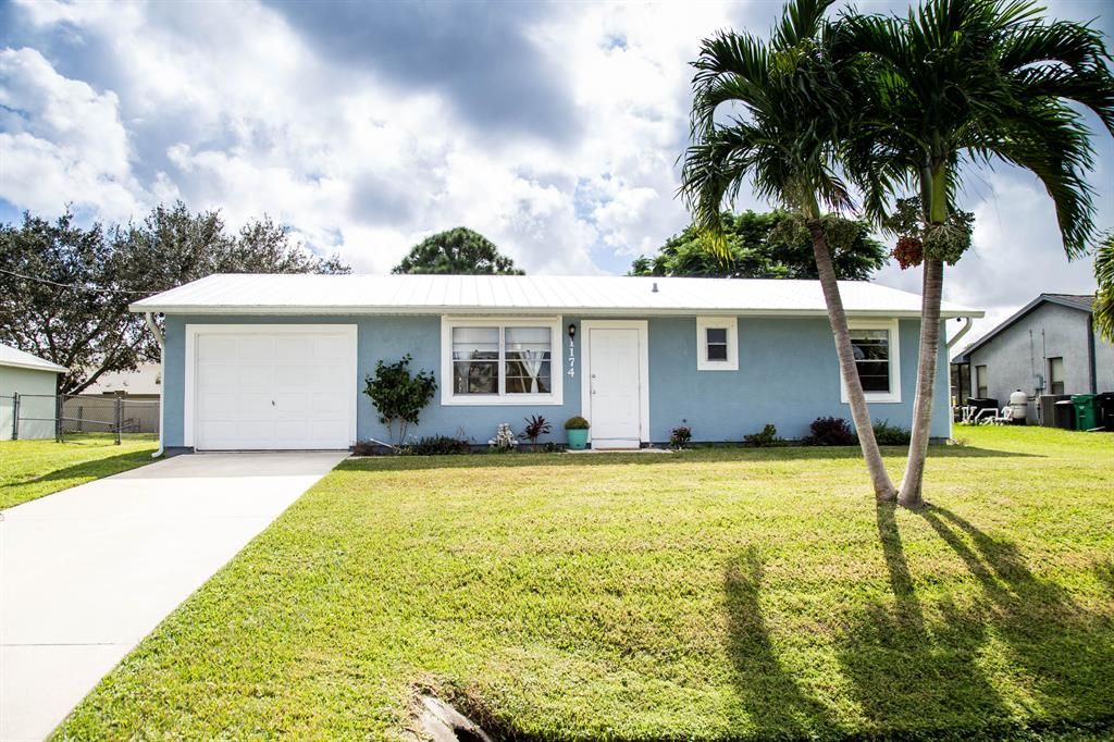 Photo of 1174 SW Coleman Avenue, Port St Lucie, FL 34953 (MLS # R10844205)