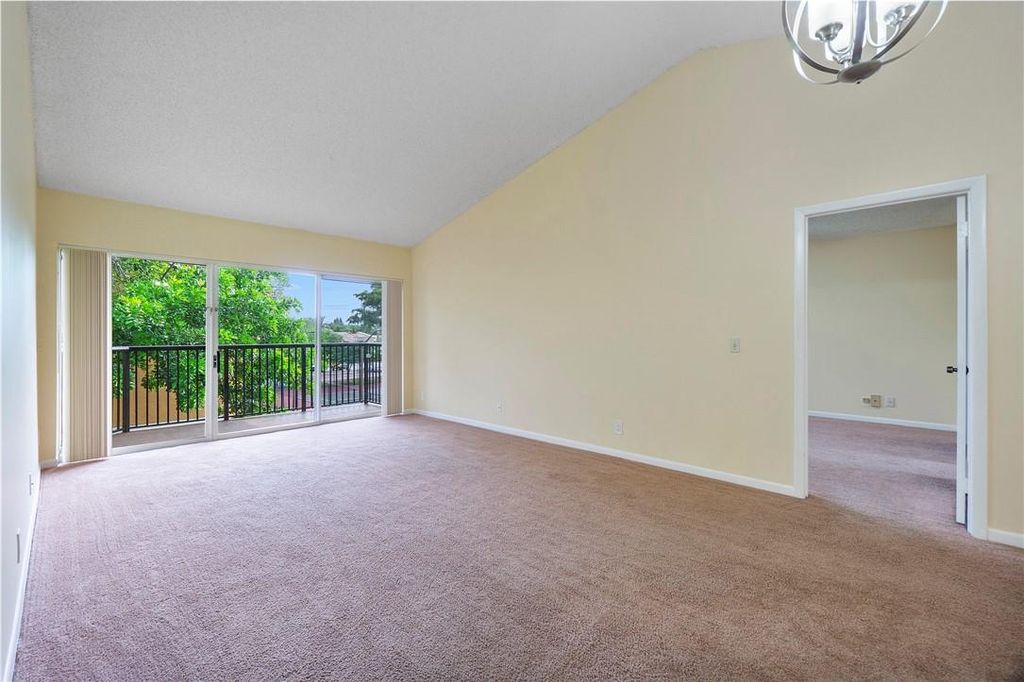 Photo of 8821 Wiles Rd #302, Coral Springs, FL 33067 (MLS # F10438078)
