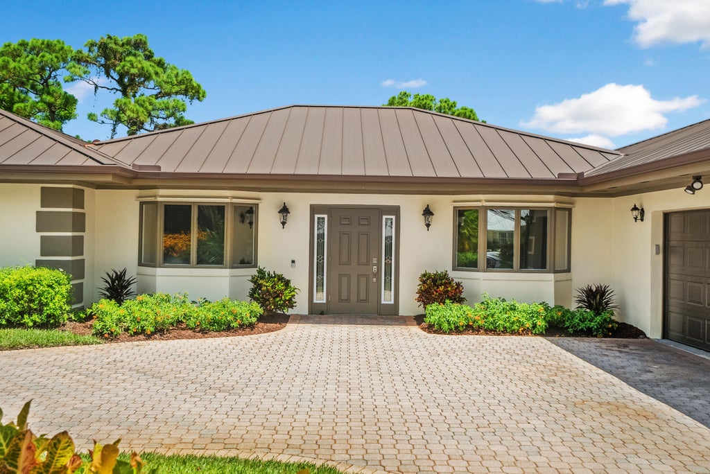 Photo of 5271 SE Burning Tree Circle, Stuart, FL 34997 (MLS # R11012631)