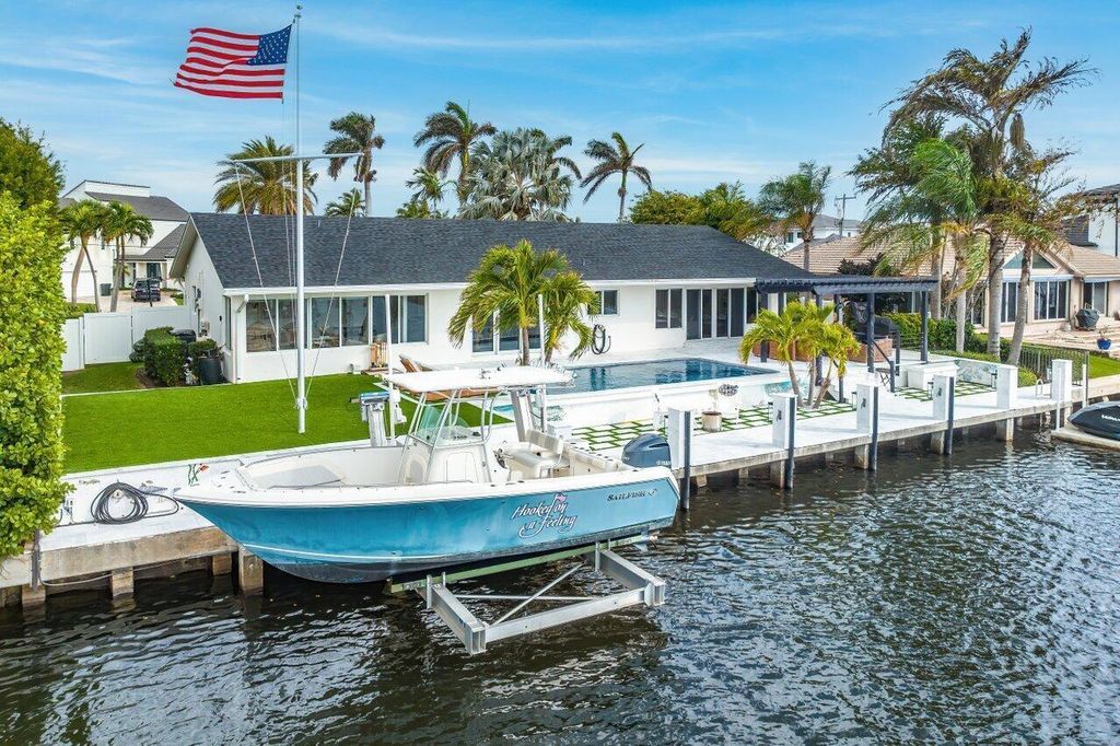 Photo of 5 Inlet Cay Drive, Ocean Ridge, FL 33435 (MLS # B26014937)