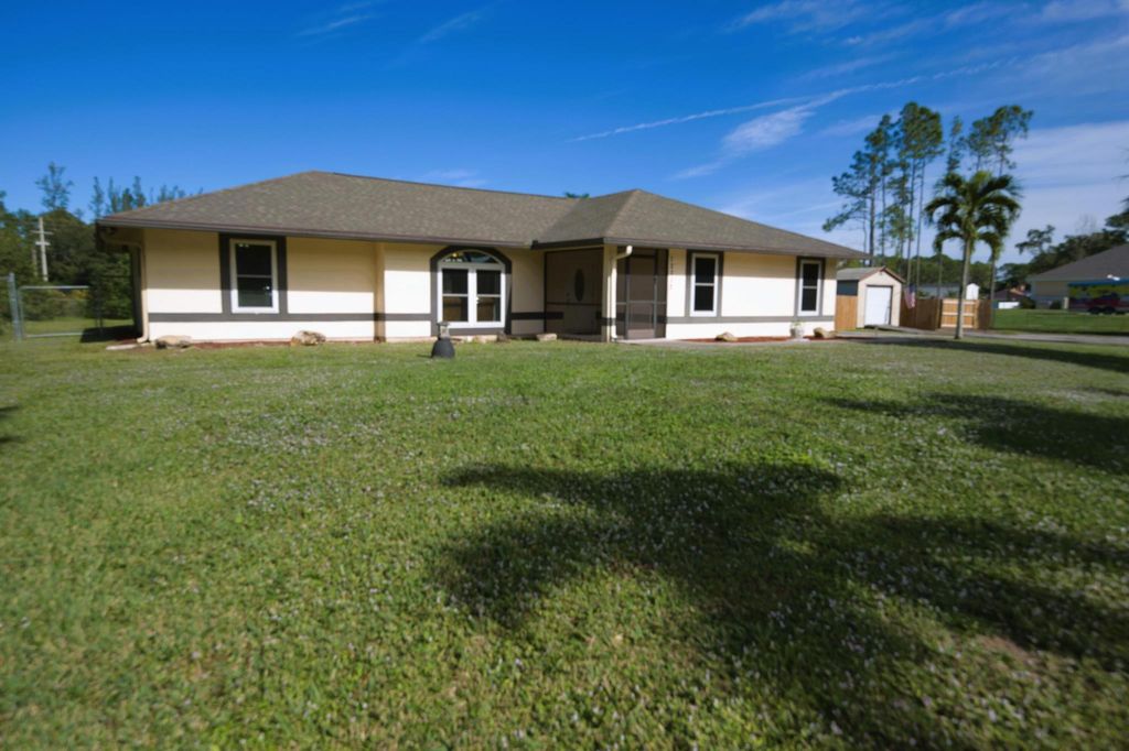 Photo of 12317 69th Street N, The Acreage, FL 33412 (MLS # R10946555)
