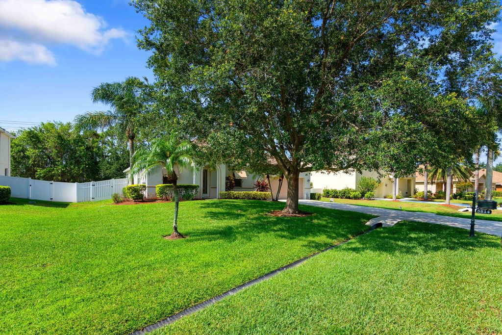 Photo of 5814 NW Windy Pines Lane, Port Saint Lucie, FL 34986 (MLS # R10989519)