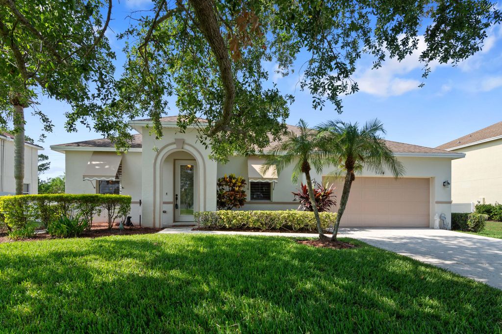 Photo of 5814 NW Windy Pines Lane, Port Saint Lucie, FL 34986 (MLS # R10989519)