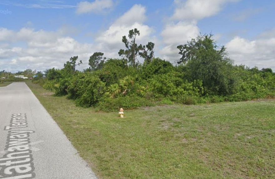 Prime opportunity to own a 0.23-acre residential lot in the highly desirable waterfront community of Port Charlotte. Located on a paved road with public water available and electricity nearby (sewer not currently available), this lot is ready for your Florida dream home or as a long-term investment. Surrounded by newer homes and future development, the property is just minutes from parks, golf courses, shopping, dining, and the beautiful Gulf beaches. No HOA fees and low annual taxes make this an excellent choice for homeowners, builders, or investors. Buyer to confirm all building requirements and utility connections with Charlotte County.