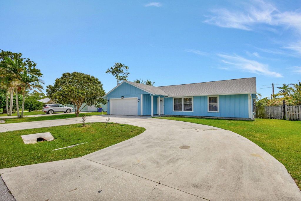 Photo of 8280 SE Sweetbay Avenue, Hobe Sound, FL 33455 (MLS # R10988257)