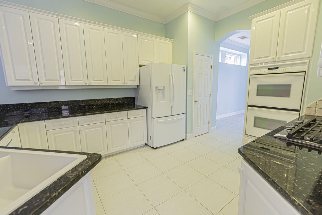 Photo of 668 SW Lake Charles Circle, Port Saint Lucie, FL 34986 (MLS # B26009833)