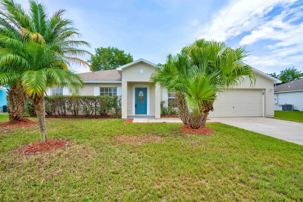 Photo of 557 SW Ray Avenue, Port St Lucie, FL 34983 (MLS # R10899282)