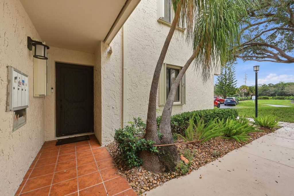 Photo of 5111 SE Miles Grant Road #102, Stuart, FL 34997 (MLS # R11158224)