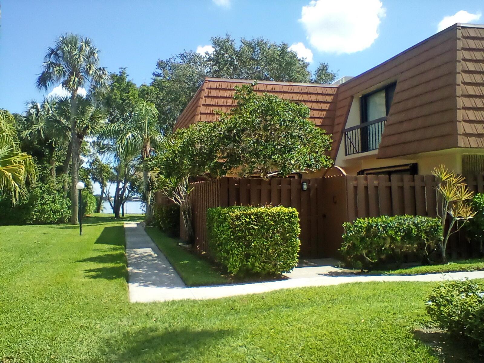 GREAT LOCATION!!!! STEP OUT YOUR FRONT GATE, GO AROUND THE CORNER AND THERE WILL BE THE WIDE VIEW OF THE HISTORIC LOXAHATCHEE RIVER. THIS BEAUTIFUL RENOVATED 2 BEDROOM, 2.5 BATH IS CENTRALLY LOCATED IN THE HEART OF JUPITER. FRESHLY PAINTED, NEW KITCHEN APPPLIANCES, CEILING FANS, ACCORDIAN HURRICANE SHUTTERS, FENCED IN PATIO TO ENJOY BBQ'S. HALF BATH DOWNSTAIRS. THIS WATERFRONT COMMUNITY HAS A PRIVATE DOCK WHERE YOU CAN ACCESS THE RIVER FOR FISHING, ENJOY WATCHING BEAUTIFUL SUNSETS OR FULL MOONS RISING, HEATED POOL AND PAVILION DIRECTLY ON THE LOXAHATCHEE WHICH IS ONLY STEPS AWAY FROM THIS UNIT. BASIC T.V., WATER, SEWER AND CABLE INCLUDED IN RENT!!!!! THERE IS ALSO A TENNIS COURT, SHUFFLE AND PICKLE BOARD. A MUST SEE , NON SMOKING UNIT. PARKING IS STEPS AWAY TOO. ALL SIZES&DATA APPR
