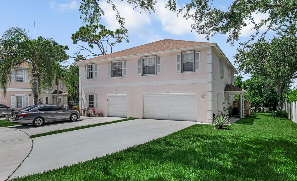 Photo of 149 Baldwin Boulevard, Greenacres, FL 33463 (MLS # B26032547)