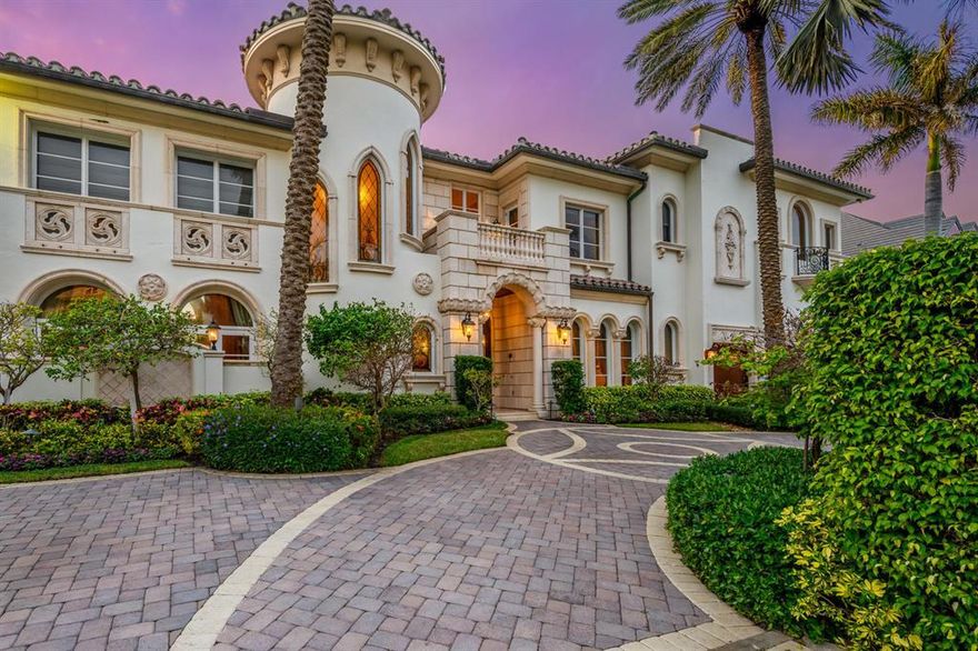 It's hard to look away from the water in this stunning and pristine home, every single room brings the outside in.  Both Grand and Magnificent in every way, custom built in 2004 and impeccably maintained and cared for as no detail was overlooked.  Double door entry to gracious foyer welcome you both inside and out the french doors to the summer kitchen, dining and sunbathing area poolside.  The kitchen invites both guests and gourmet chef to enjoy the 6 burner Wolf natural gas range, granite countertops, Sub-zero refrigerator and freezer, custom cabinetry and dining area.   Remarkable Living room with fireplace and soaring ceilings with impressive views of the pool and intracoastal allow you to relax and  watch the boats go by. Winding staircase with stained glass takes you up to 2nd floor bedrooms each en suite with closet space and 3 with Intracoastal sunset views.  Home is also equipped with an elevator, the expansive Master bedroom with seating area, west facing balcony,  and his and her closets and Master bathrooms leave one wanting for nothing. Other features include well appointed den with water views, formal dining room with butler pantry, upstairs and downstairs laundry rooms, 3 car garage,