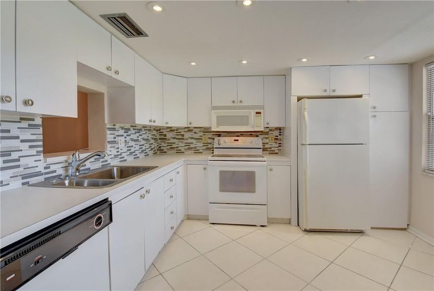 GREAT OPPORTUNITY!. NICE MOVE IN CONDITION 2BEDROOM/2BATH AVAILABLE FOR SALE. NEW KITCHEN CEILING WITH HIGH HATS LIGHTING. NEW COUNTER TOPS. GLASS BACKSPLASH IN THE KITCHEN. LAMINATE FLOOR THROUGHT-OUT. NEW TOILETS IN BATHROOMS. CONDO IS FRESHLY PAINTED. A/C WAS INSTALLED 7/2/18. SCREENED PATIO OVERLOOKING THE BEAUTIFUL POOL. PRICE IS NEGOTIABLE. A MUST SEE!! ASSOC REQUIRES 20% DOWN & 1 OCCUP 55+ VACANT/CLICK ON SHOWING ASSIST