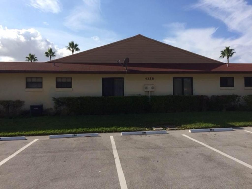 Photo of 4328 Woodstock Drive #D, West Palm Beach, FL 33409 (MLS # R11151484)