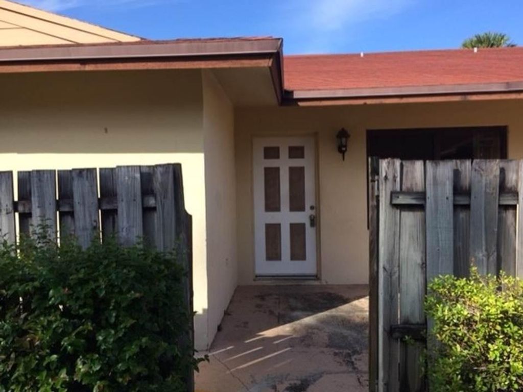 Photo of 4328 Woodstock Drive #D, West Palm Beach, FL 33409 (MLS # R11151484)