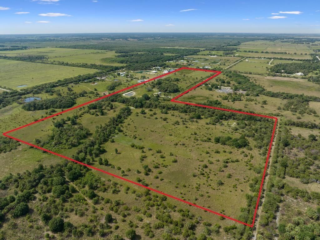 Photo of 7860 Germany Canal Road, Port Saint Lucie, FL 34987 (MLS # F10480115)