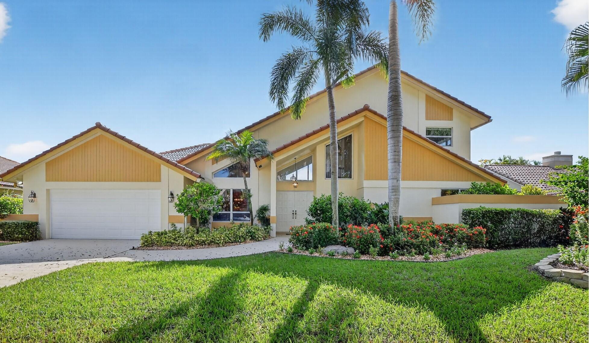 Don't miss this opportunity! Own your dream home in Colonnade, the highly sought-after & beloved non-gated community in central Boca Raton. From the moment you enter, you'll be captivated by the soaring ceilings, dramatic two-story windows & abundant natural light that fills every corner of the open-concept layout, neutral tones & expansive ceilings create a bright, airy & serene ambiance--perfect for both everyday living & stylish entertaining. This pristinely maintained move-in ready residence spans nearly 3,000sf of thoughtfully designed living space featuring a generously sized primary bdrm & bath + 1 additional bdrm & cabana bath downstairs; 2 spacious bedrooms with a jack & Jill bath upstairs, all nestled on a lush private lot with views of the sparkling pool, huge deck & green space