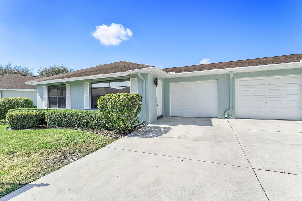 Photo of 9860 Pecan Tree Drive #A, Boynton Beach, FL 33436 (MLS # R11164696)