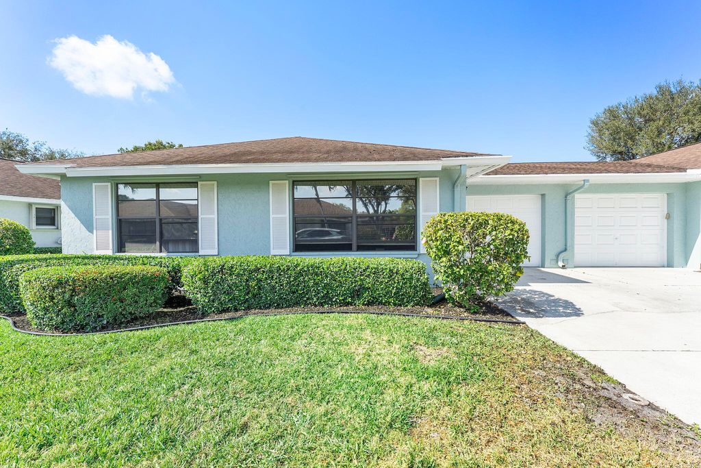 Photo of 9860 Pecan Tree Drive #A, Boynton Beach, FL 33436 (MLS # R11164696)