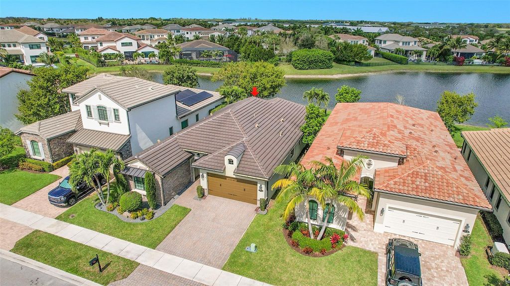 Photo of 8668 Grand Prix Lane, Boynton Beach, FL 33472 (MLS # F10489421)