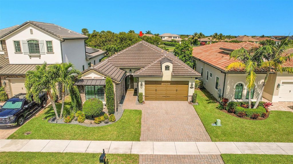 Photo of 8668 Grand Prix Lane, Boynton Beach, FL 33472 (MLS # F10489421)
