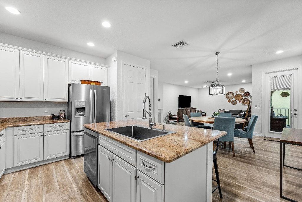 Photo of 1056 Community Drive, Jupiter, FL 33458 (MLS # R11132890)