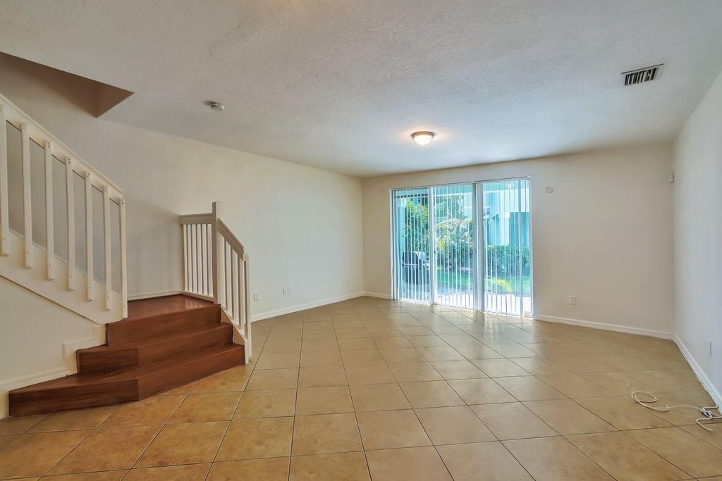 Photo of 1969 Alamanda Way #1969, Riviera Beach, FL 33404 (MLS # B26019014)