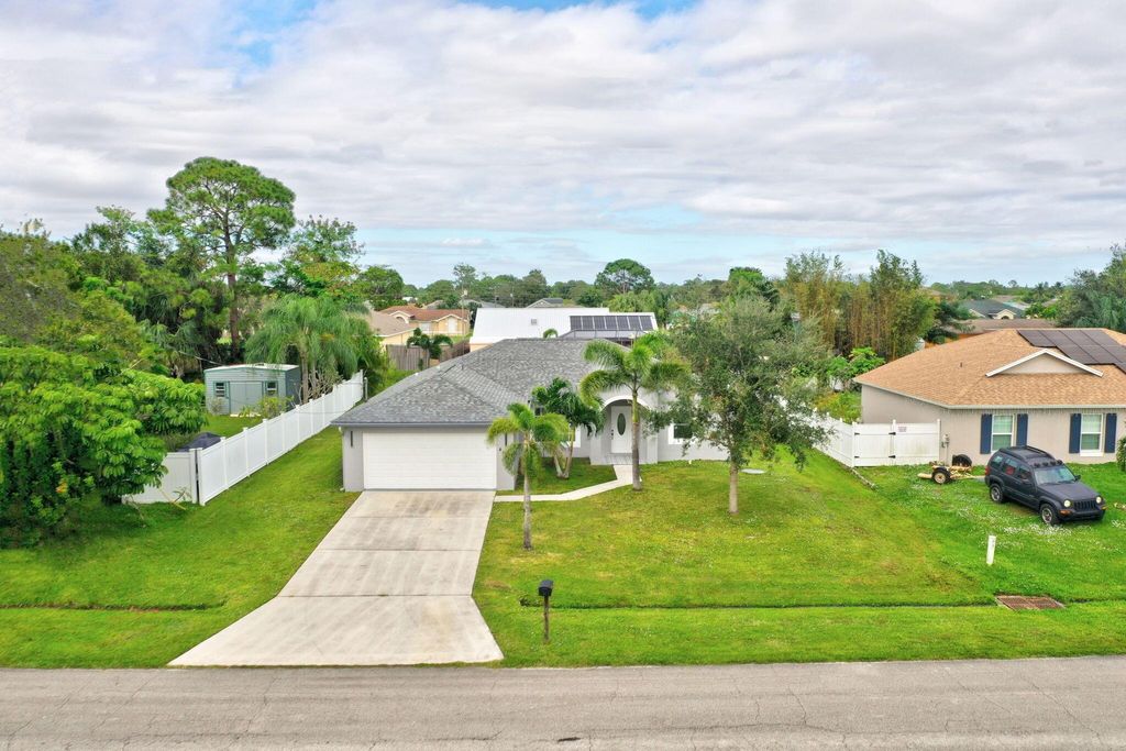 Photo of 457 SW Todd Avenue, Port Saint Lucie, FL 34983 (MLS # R11042589)