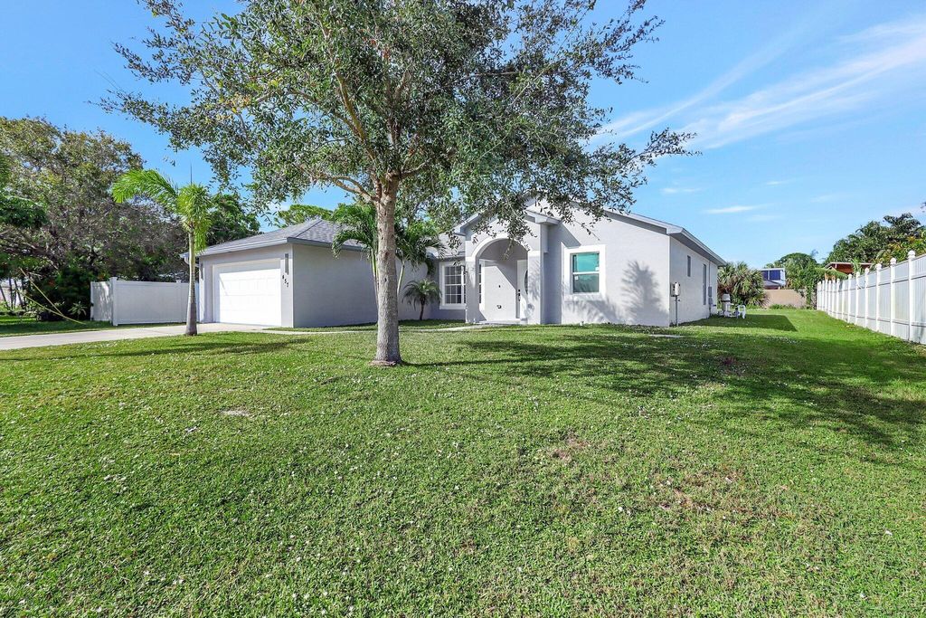 Photo of 457 SW Todd Avenue, Port Saint Lucie, FL 34983 (MLS # R11042589)
