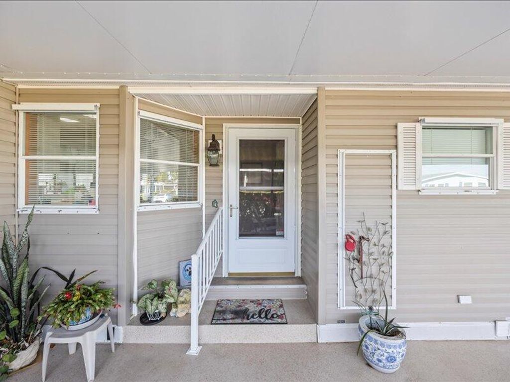 Photo of 3817 Sleepy Hollow Lane, Port Saint Lucie, FL 34952 (MLS # R11147732)