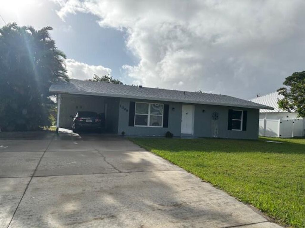 Photo of 1068 SE Floresta Drive SE, Port Saint Lucie, FL 34983 (MLS # R11045961)