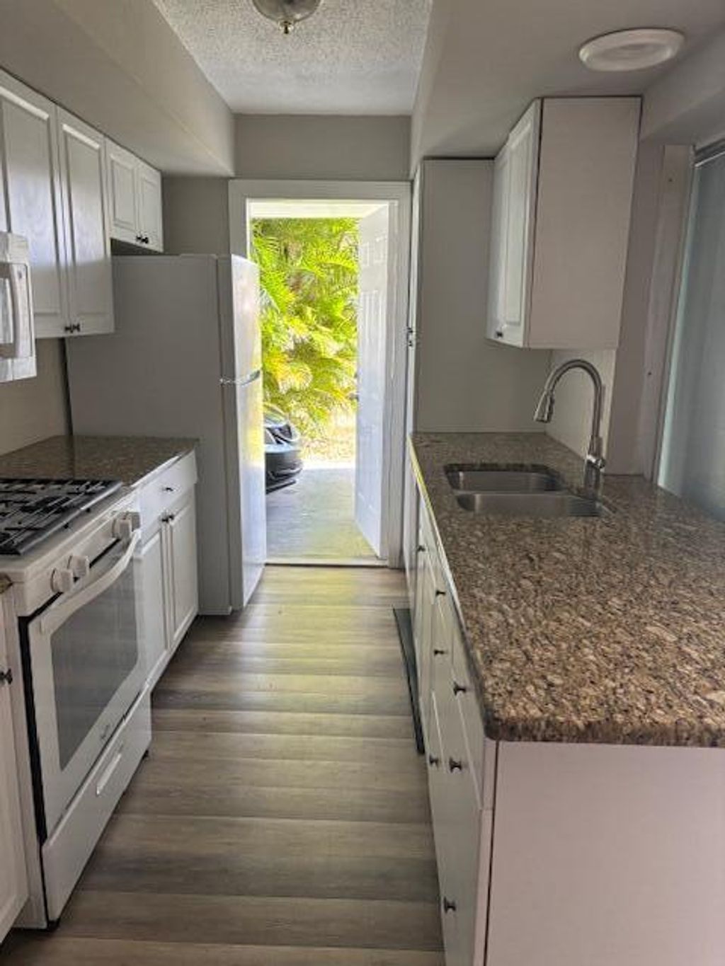 Photo of 1068 SE Floresta Drive SE, Port Saint Lucie, FL 34983 (MLS # R11045961)