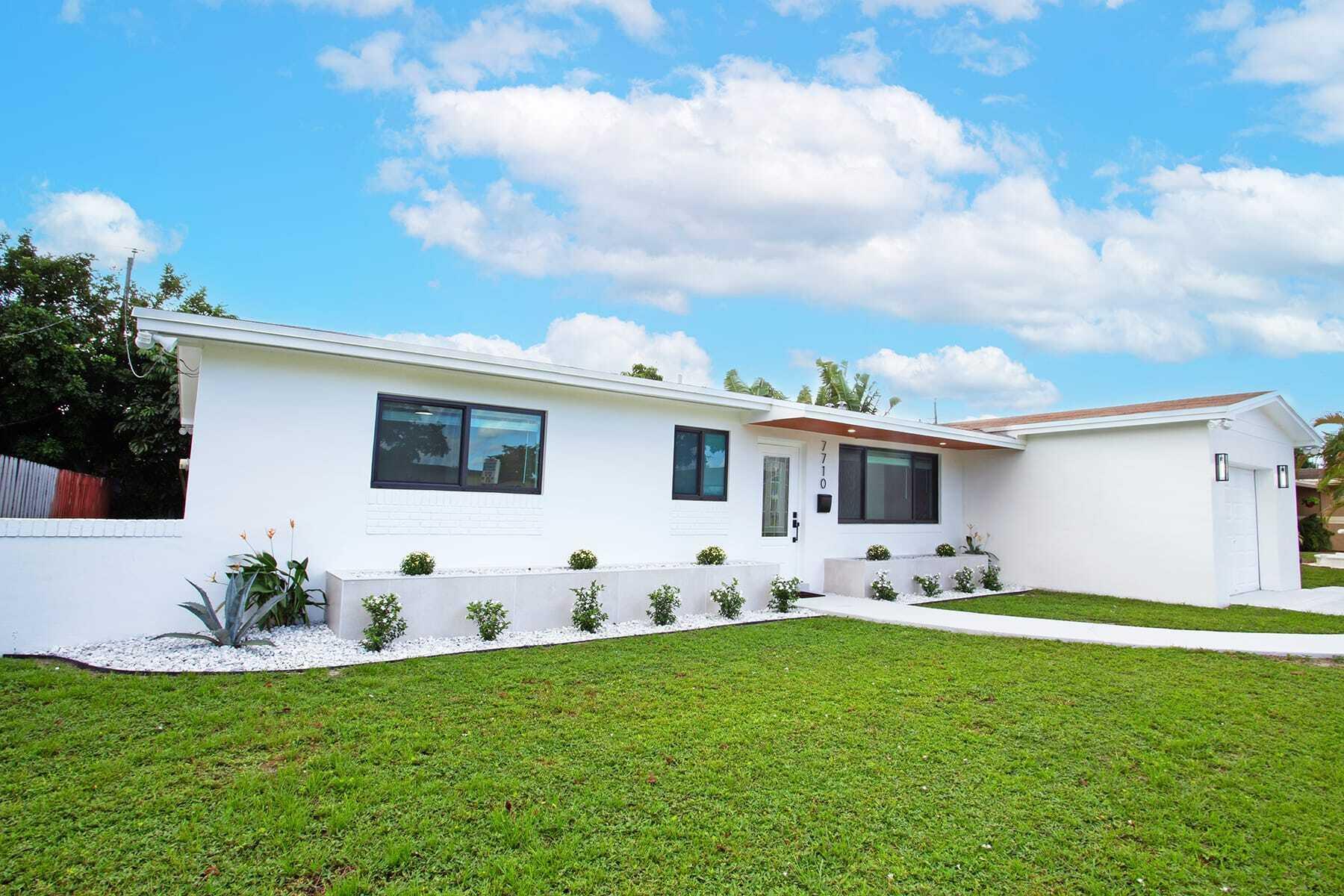 Immaculately renovated home. Features hurricane impact windows and doors, porcelain floor tiles throughout. 100% wood kitchen cabinets with quartz countertops. Stainless Steel appliances, LED lighting, Spacious 1 car garage with washer & Dryer hookups. Property sits very close proximity to shopping and fine dining.