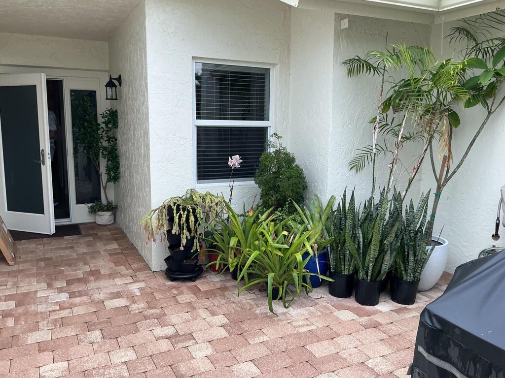 Photo of 6918 BARBAROSSA Street, Boca Raton, FL 33433 (MLS # B26059921)