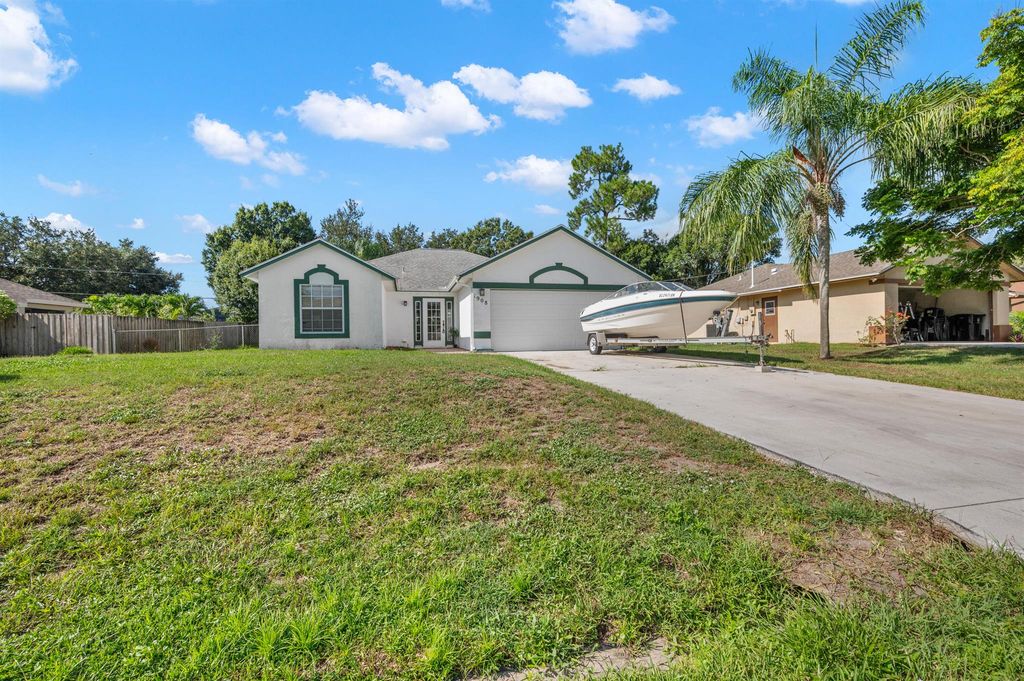 Photo of 1908 SW Notre Dame Avenue, Port St Lucie, FL 34953 (MLS # R11112944)