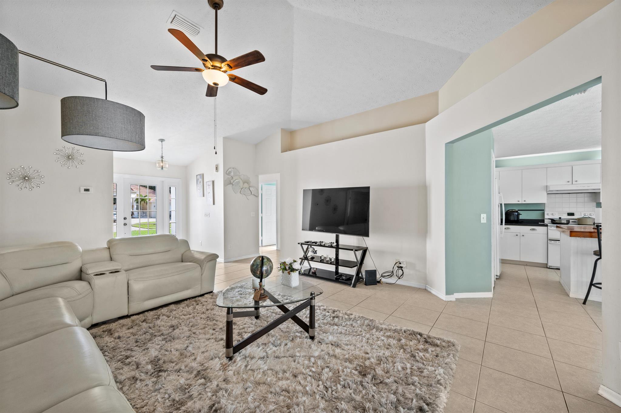 FL Coastal living here we go! Are you ready for your slice of heaven in your oasis? Light colors, airy feeling, open spaces, modern kitchen, and updated bathrooms. This 3/2/2 with a pool rental has it all. Including a private screened enclosure surrounding the pool. Move in Ready. In the Heart of the growing Port St. Lucie. Near Shopping, Restaurants and only 25 minute from the ocean if the pool isn't enough. It has a fenced in back yard as well.