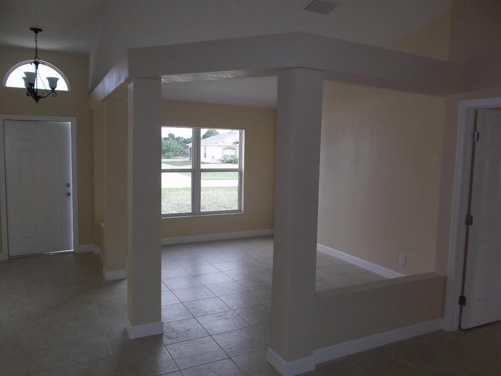 Photo of 319 SW Fig Avenue, Port Saint Lucie, FL 34953 (MLS # R10949788)