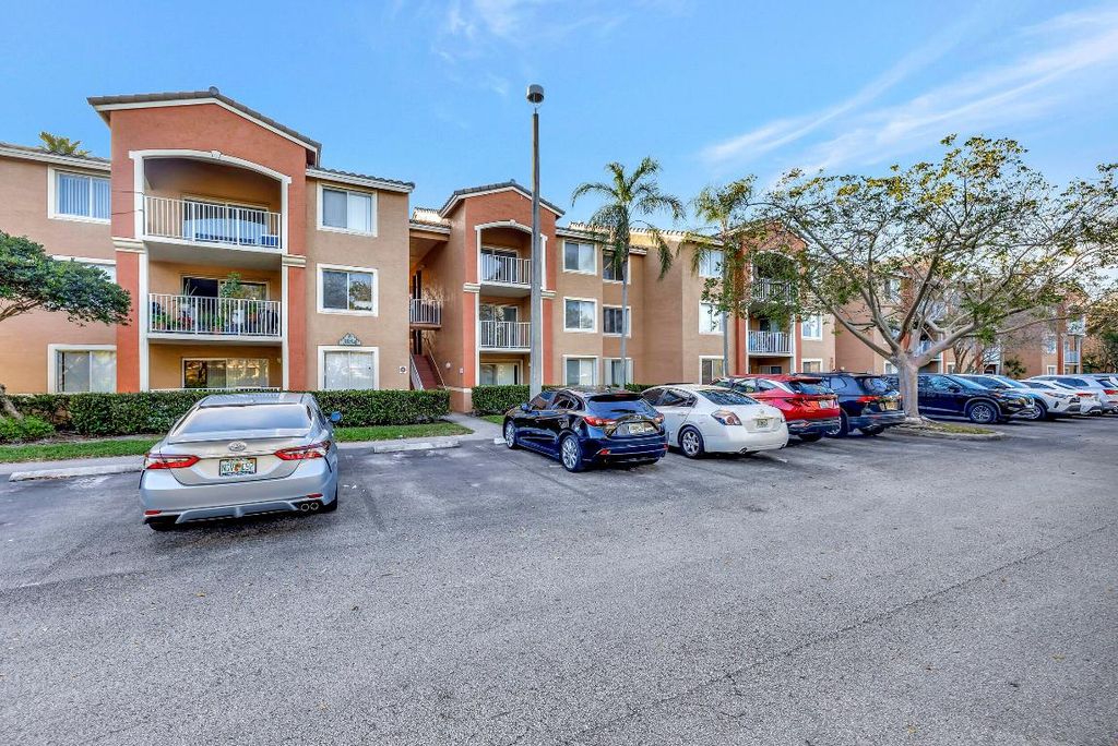 Photo of 3854 Lyons Road #203-5, Coconut Creek, FL 33073 (MLS # R10964049)