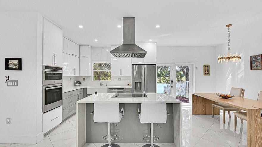 Welcome to this beautifully updated 4-bedroom, 3-bath townhome in the highly desirable Waterways at Pembroke Pines. Offering the space and the feel of a single family home with its high ceilings and bright open spaces including its tranquil water views from your private patio. Enjoy a renovated kitchen with quartz countertops, island and stainless steel appliances. The renovated bathrooms with sophisticated finishes are done to perfection. Waterways offers a gorgeous pool and a party room to enjoy for family gatherings and friends. This home is located near top rated A schools, shopping centers , recreational parks and all that Pembroke Pines has to offer. This beauty wont last!