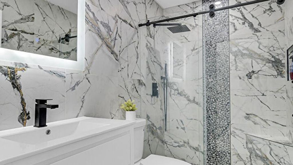 Photo of 518 NW 130th Way, Pembroke Pines, FL 33028 (MLS # F10545582)