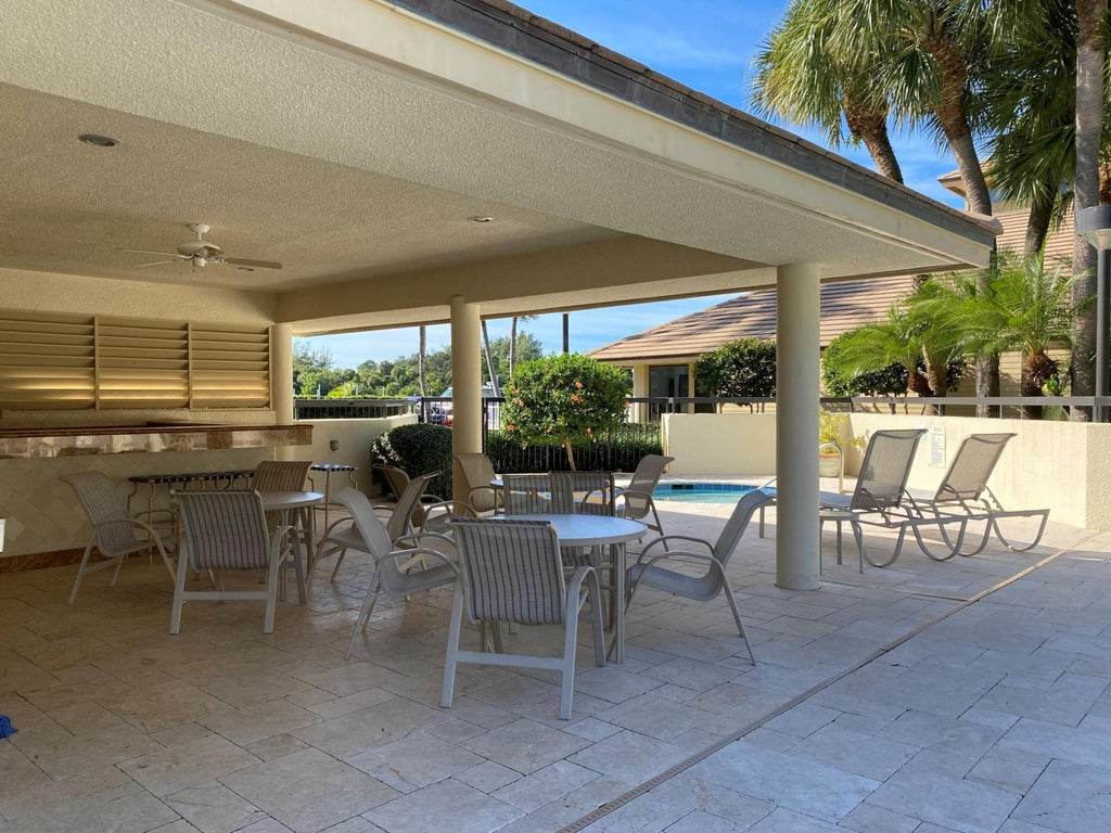 Photo of 337 Oak Harbour Drive, Juno Beach, FL 33408 (MLS # B26078048)