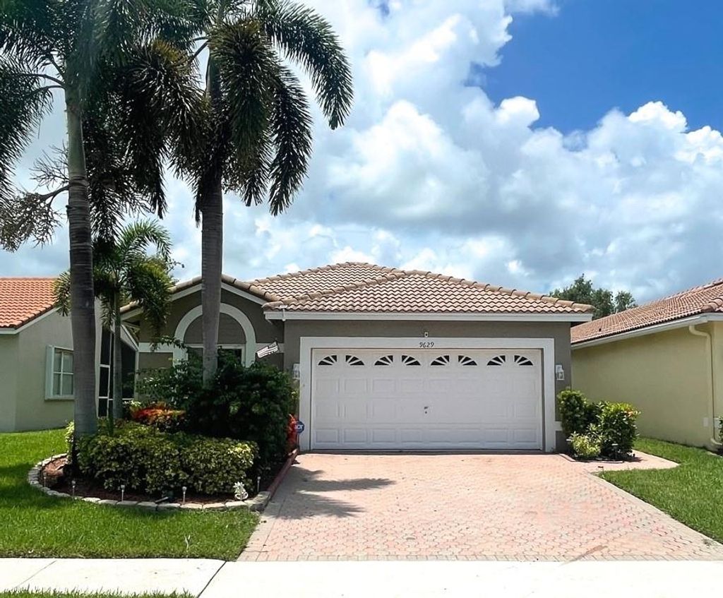Photo of 9629 Cherry Blossom Ct Ct, Boynton Beach, FL 33437 (MLS # F10341187)
