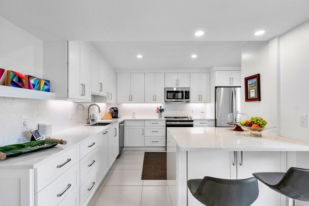 Photo of 3611 Quail Ridge Drive #Bobwhite A, Boynton Beach, FL 33436 (MLS # R11006258)