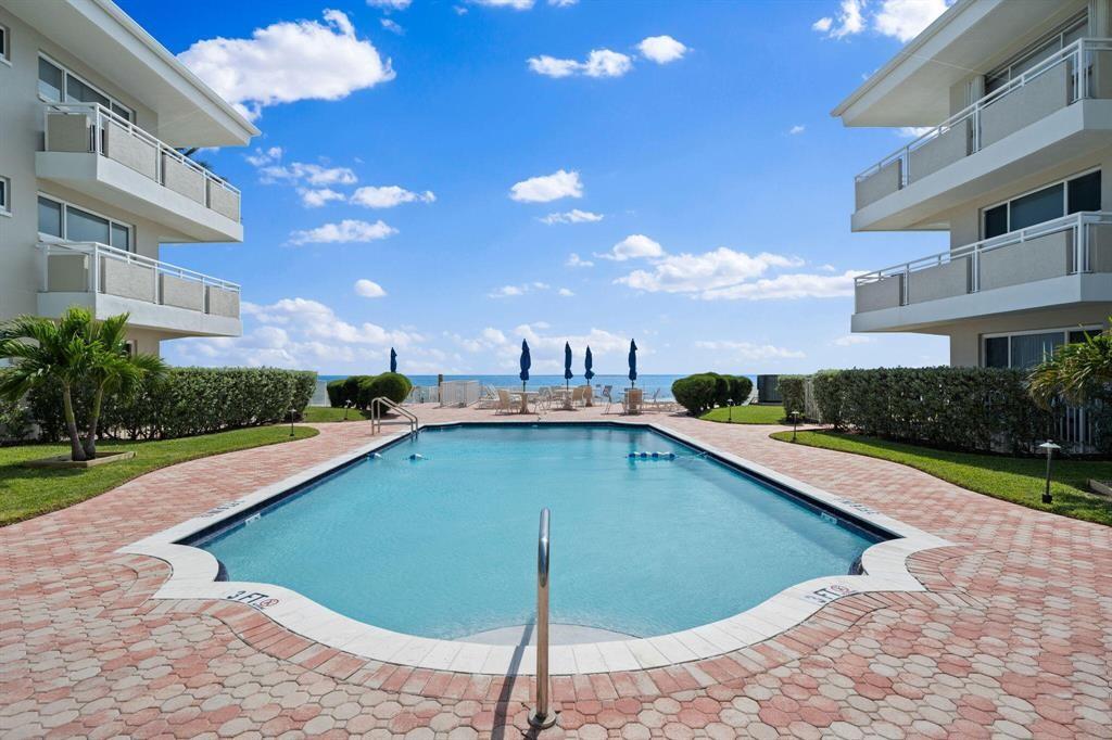 This Is Your Completely Renovated Dream Vacation Home. Located On Millionaire Mile You Can Walk Out Of Your Home And Step On The Sand In One Of The Most Prestigious Beaches In All Of South Florida. This Direct Ocean Access 2 Bed 2 Bath Condo Is Fully Renovated With Wood Finish Tile Floors Throughout, Quartzite Countertops, Hurricane Impact Windows And Doors, Built In Closets, And A New AC Unit. Two Heated Pools On The Beachside And The Intracoastal Side, A Private 9-hole Putting Green Surface, Same Floor Laundry, BBQ Area, Deeded Storage Unit, Immaculately Kept Grounds. This Is A Luxury Full Beach Access Experience.