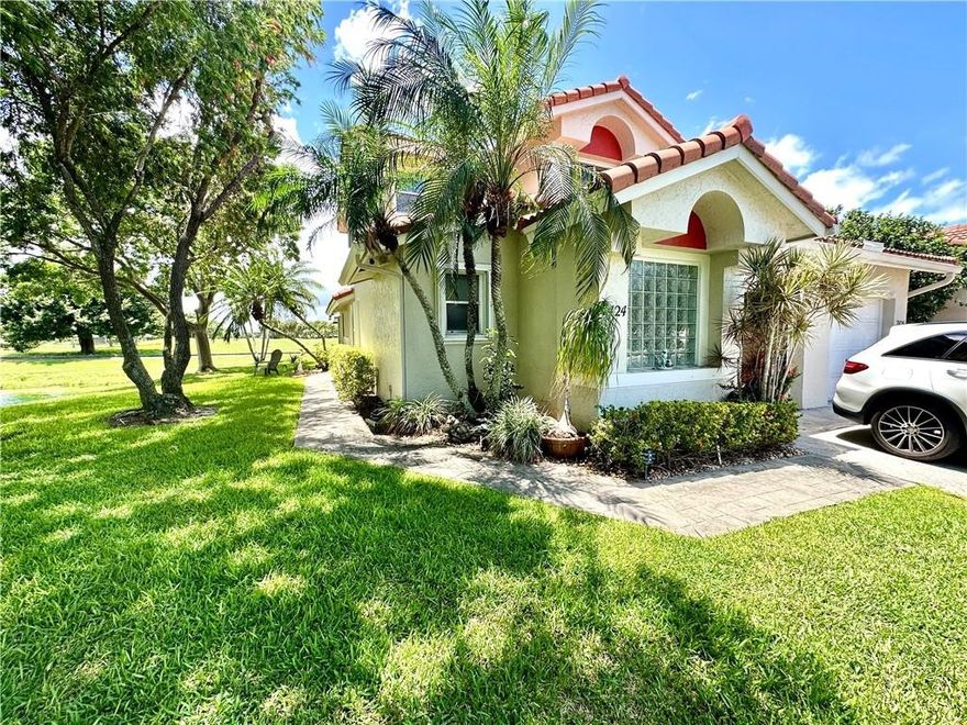 Premium, private location! Last home on the street, end unit with huge lot (5,771 sq ft) and panoramic views of lake and former Carolina Golf Course. Master bedroom, full and half bathroom all located on first floor.  Granite counters, wood cabinetry and stainless steel appliances. Inside laundry on first level. PETS PERMITTED-up to 40 lbs / HOA includes roof repairs, replacement, landscaping  and exterior paint. IMMEDIATE RENTALS PERMITTED. Amenities include clubhouse, heated pool and fitness center.  Accordion shutters all around. There are two associations: Miami Mgmt $350 per month / master assoc is Integrity Prop Mgmt $140 per year.