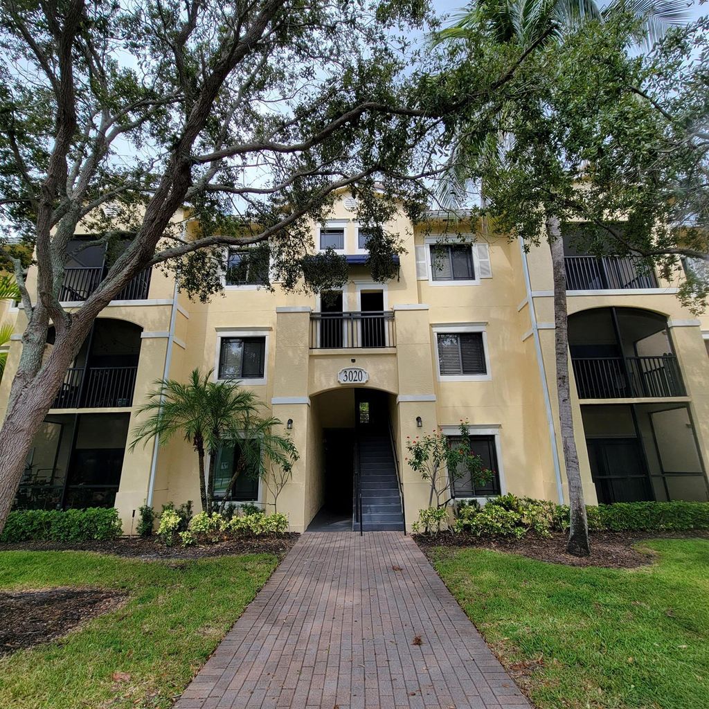 Photo of 3020 Alcazar Place #107, Palm Beach Gardens, FL 33410 (MLS # R10918239)